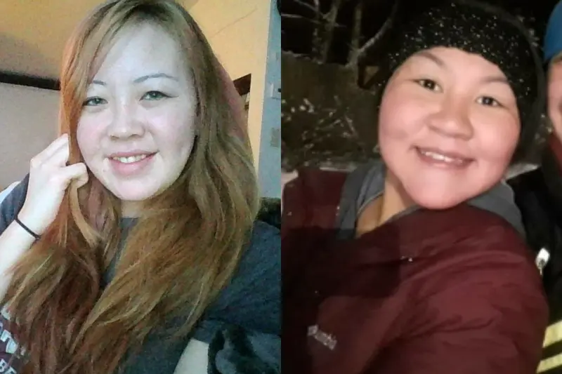 Two smiling women, one with red-tinted long hair, the other in a jacket and winter hat.